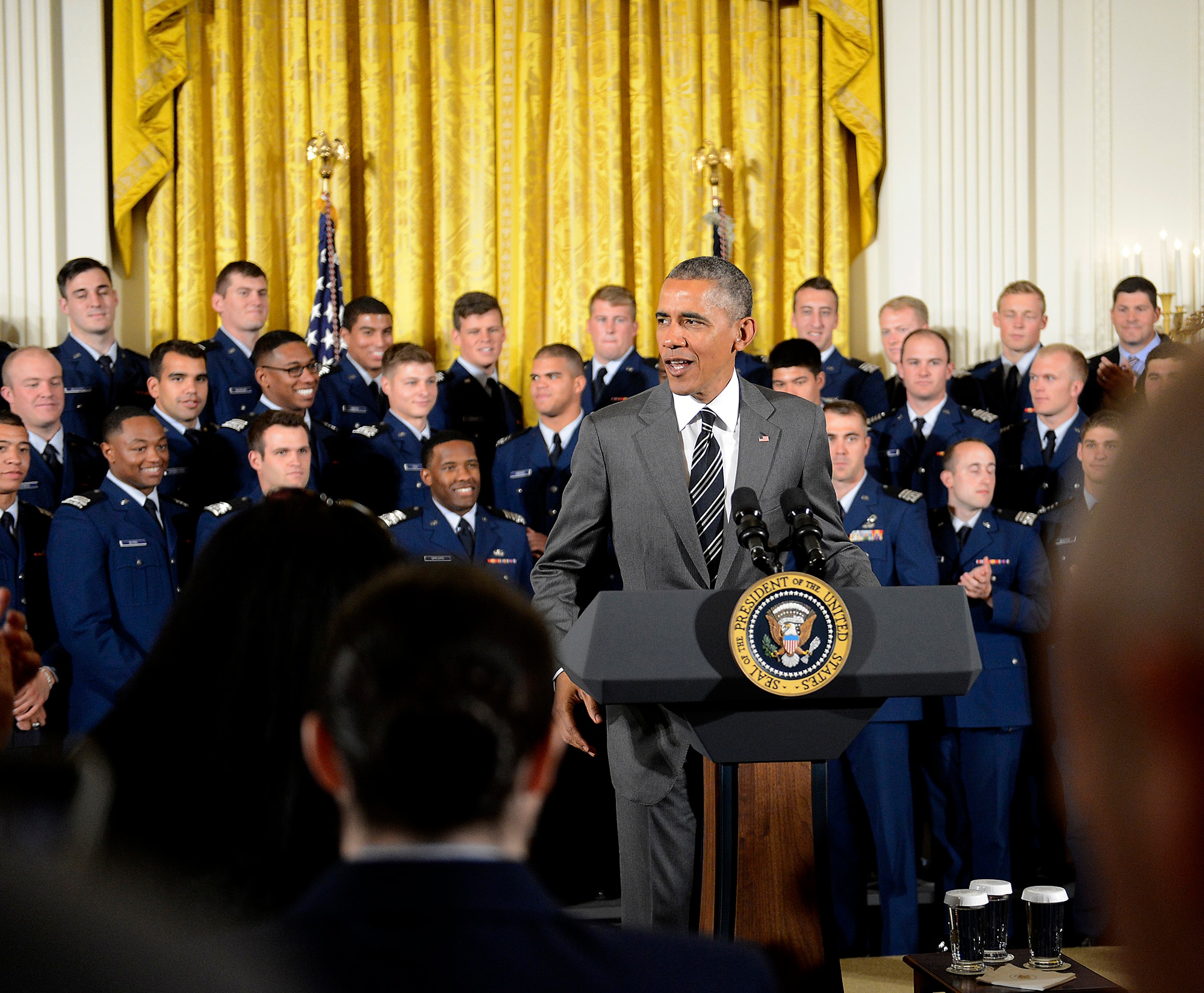 President Barack Obama congratulates the U.S. Air Force Academy football team with the Commander-in-Chief's Trophy at the White House May 7, 2015. With the team were Lt. Gen. Michelle D. Johnson, the superintendent of the Academy, and Air Force Chief of Staff Gen. Mark A. Welsh III. (U.S. Air Force photo/Scott M. Ash)