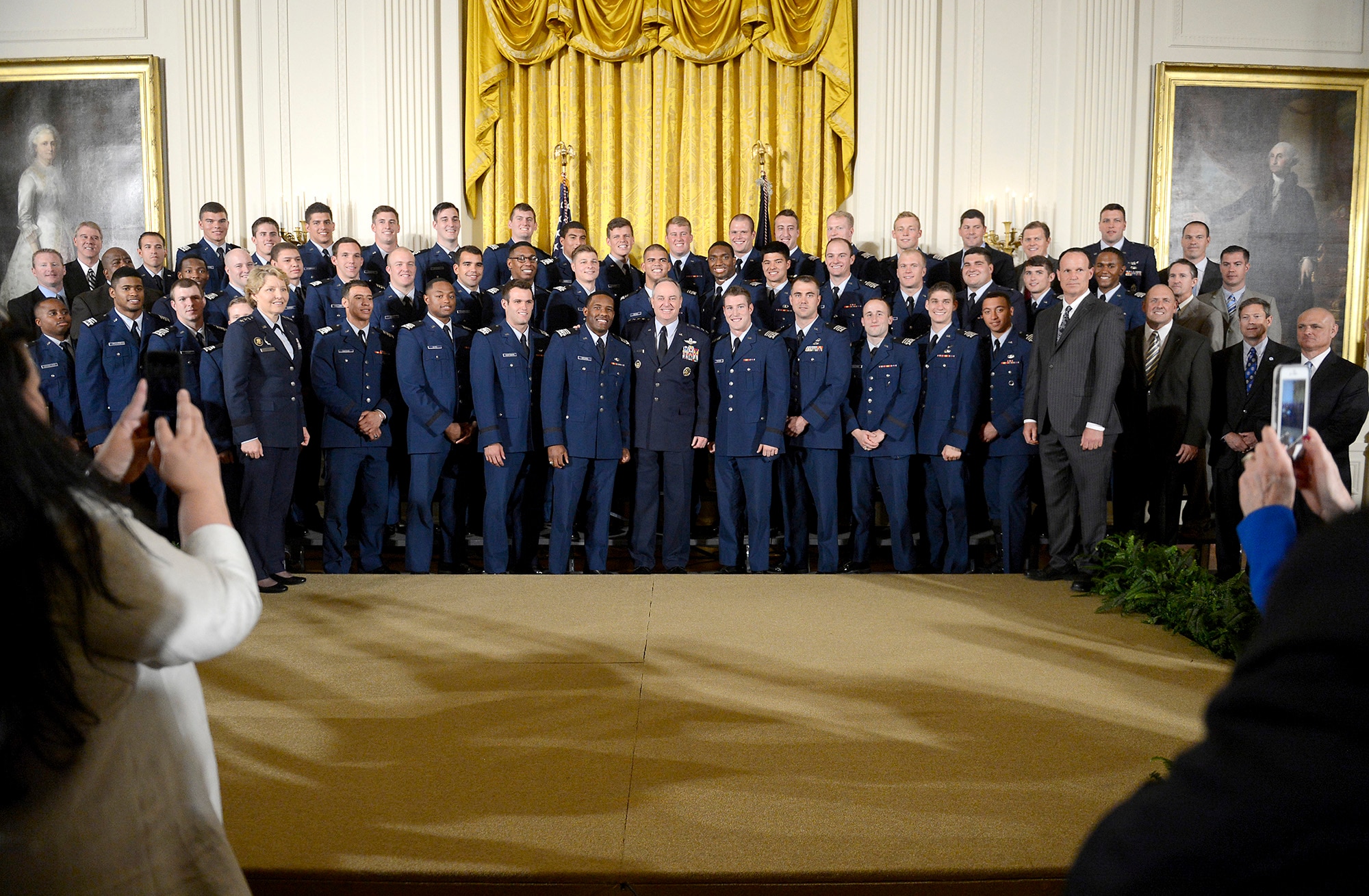 Air Force Chief of Staff Gen. Mark A. Welsh III, center, stands with Lt. Gen. Michelle D. Johnson, superintendent of the U.S. Air Force Academy, and Academy head football coach Troy Calhoun, after the team received the Commander-in-Chief's trophy from President Barack Obama at the White House May, 7, 2015. (U.S. Air Force photo/Scott M. Ash)   