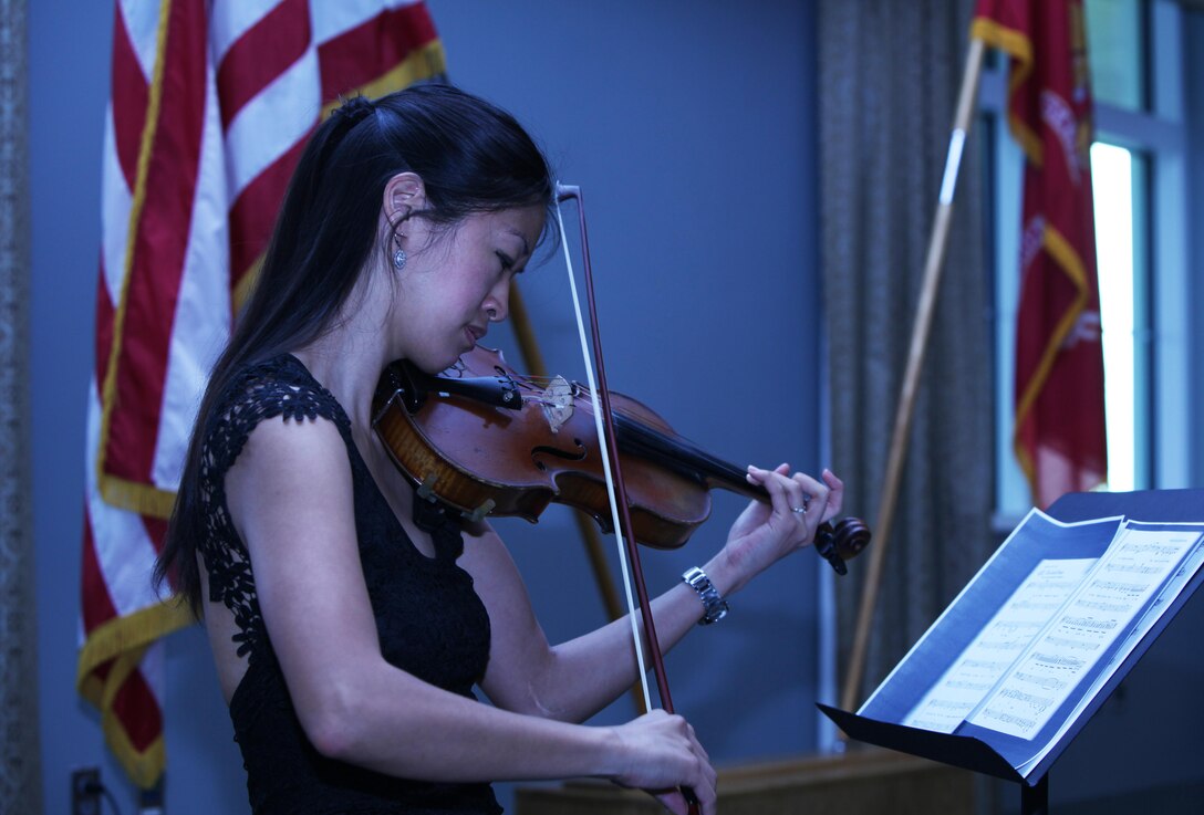Bonnie Morden plays violin during the National Day of Prayer breakfast at Marine Corps Air Station Cherry Point, North Carolina, May 7, 2015. Morden played individual musical pieces for the event in honor of the National Day of Prayer.
