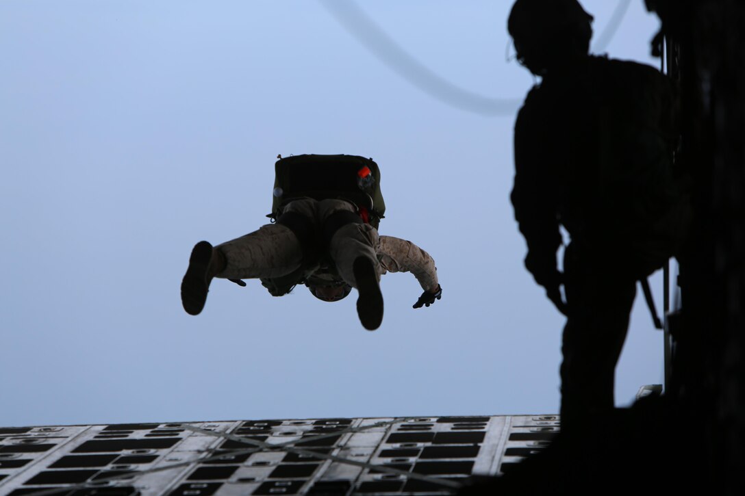 Critical skills operators with U.S. Marine Corps Forces Special Operations Command leap out of a KC-130J Super Hercules during parachute training above Marine Corps Base Camp Lejeune, North Carolina, May 6, 2015. CSOs were supported by Marine Aerial Refueler Transport Squadron 252 from Marine Corps Air Station Cherry Point, North Carolina. Aerial deliveries are one of the mission essential skills VMGR-252 provides in support of the Marine Air-Ground Task Force.