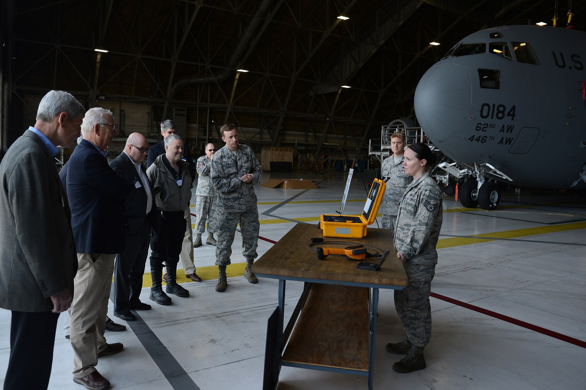 Members of the Business Executives for National Security are briefed on the maintenance requirements for a C-17 Globemaster III, May 7, 2015, at Joint Base Lewis-McChord, Wash. Retired Gen Norton A. Schwartz, former Air Force chief of staff, is the President and CEO of BENS(U.S. Air Force photo\Staff Sgt. Tim Chacon)
