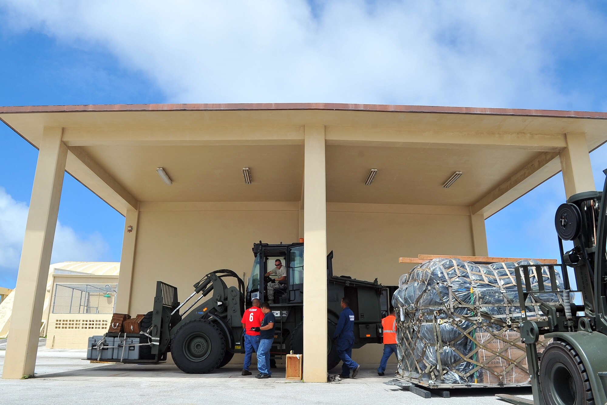 U.S. Air Force Tech. Sgt. Randy Walgren, 36th Mobility Response Squadron NCO in charge of aerial operations, moves a forklift for cargo processing May 1, 2015, at Andersen Air Force Base, Guam, in preparation for deployment to Nepal. Walgren and his unit the 36th Contingency Response Group will join U.S. Department of State and U.S. Agency for International Development led humanitarian and disaster relief operations in support of the Government and Armed Forces of Nepal.  (U.S. Air Force photo by Staff Sgt. Melissa White/Released)