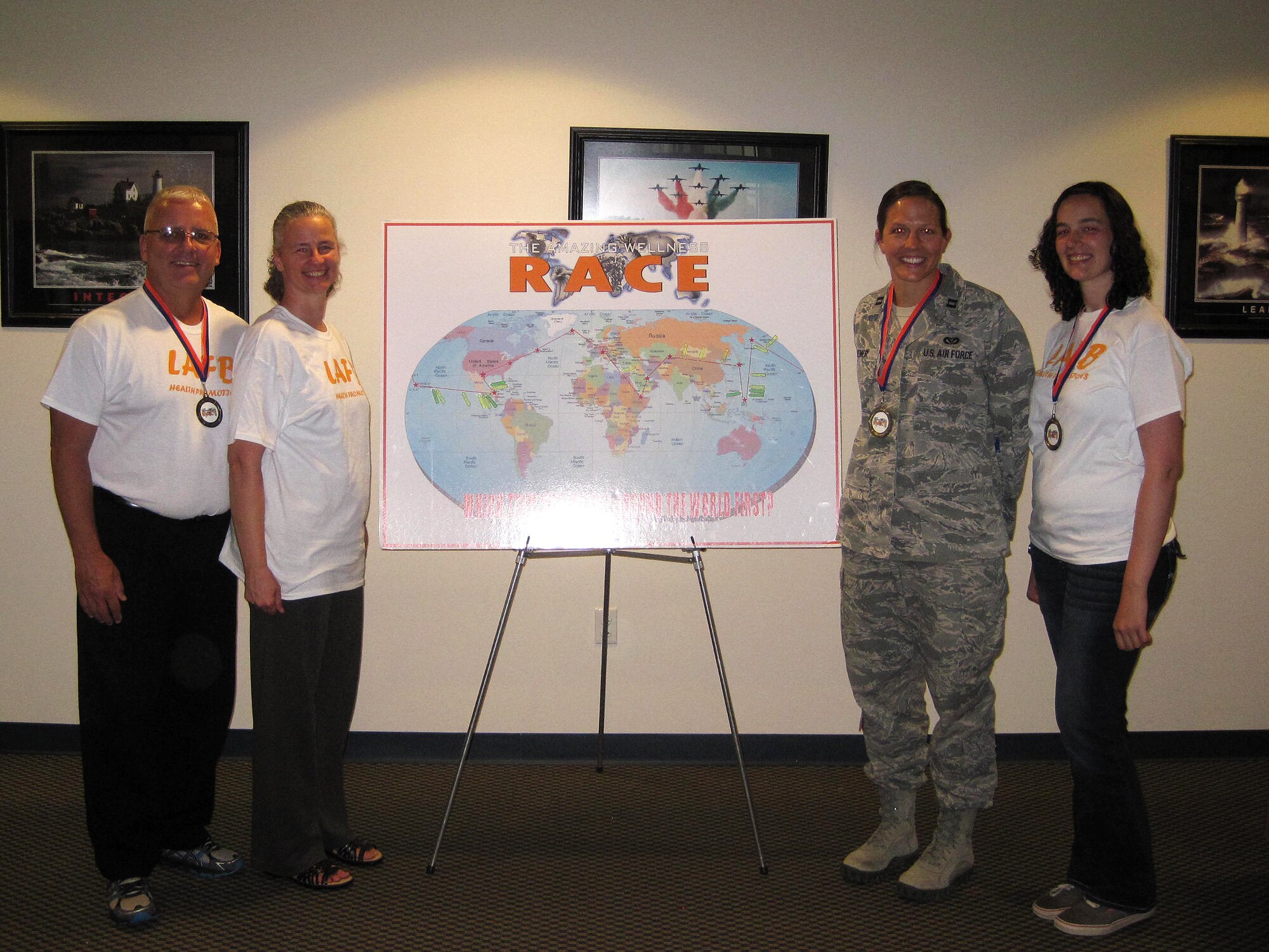 The H2CR team poses for a photo at the Health Promotion center on Laughlin Air Force Base, Texas, May 6, 2015. The H2CR team logged the most miles and reduced the most body fat percentage, logging a total of 31, 805 miles and reduced 3.22 percent of their body fat in the six-week long Amazing Wellness Race. (Courtesy Photo)