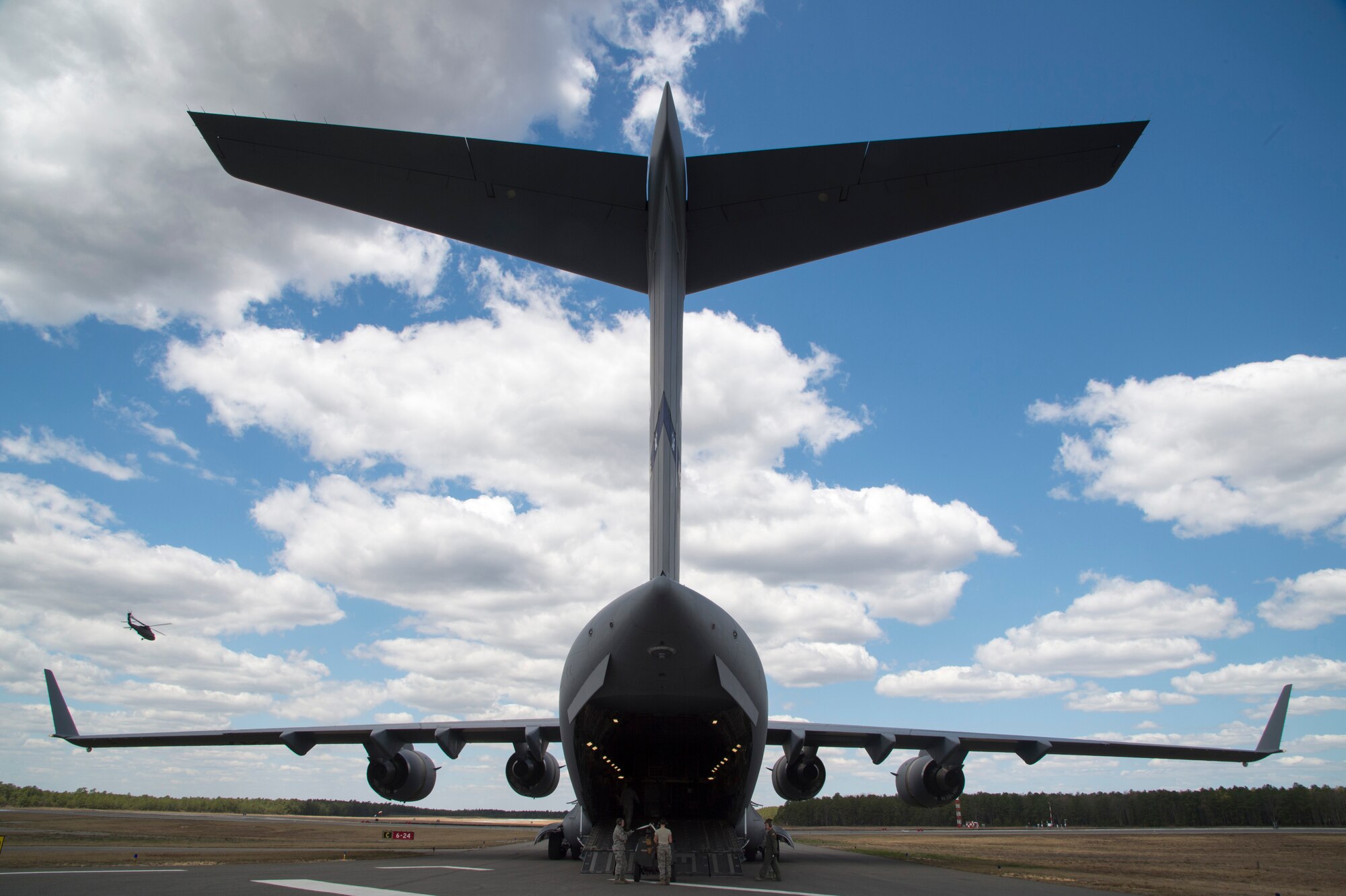 Airmen from the 621st Contingency Response Wing load equipment onto a U.S. Air Force Globemaster III C-17 during an exercise at Joint Base McGuire-Dix-Lakehurst, N.J., April 29. The exercise helped train the crew members from five C-17’s, conducted engine running offloads, communication proficiency training, night vision goggle training, and a ramp coordinator chief received upgraded training during this exercise. (U.S. Air Force photo/Staff Sgt. Gustavo Gonzalez)
