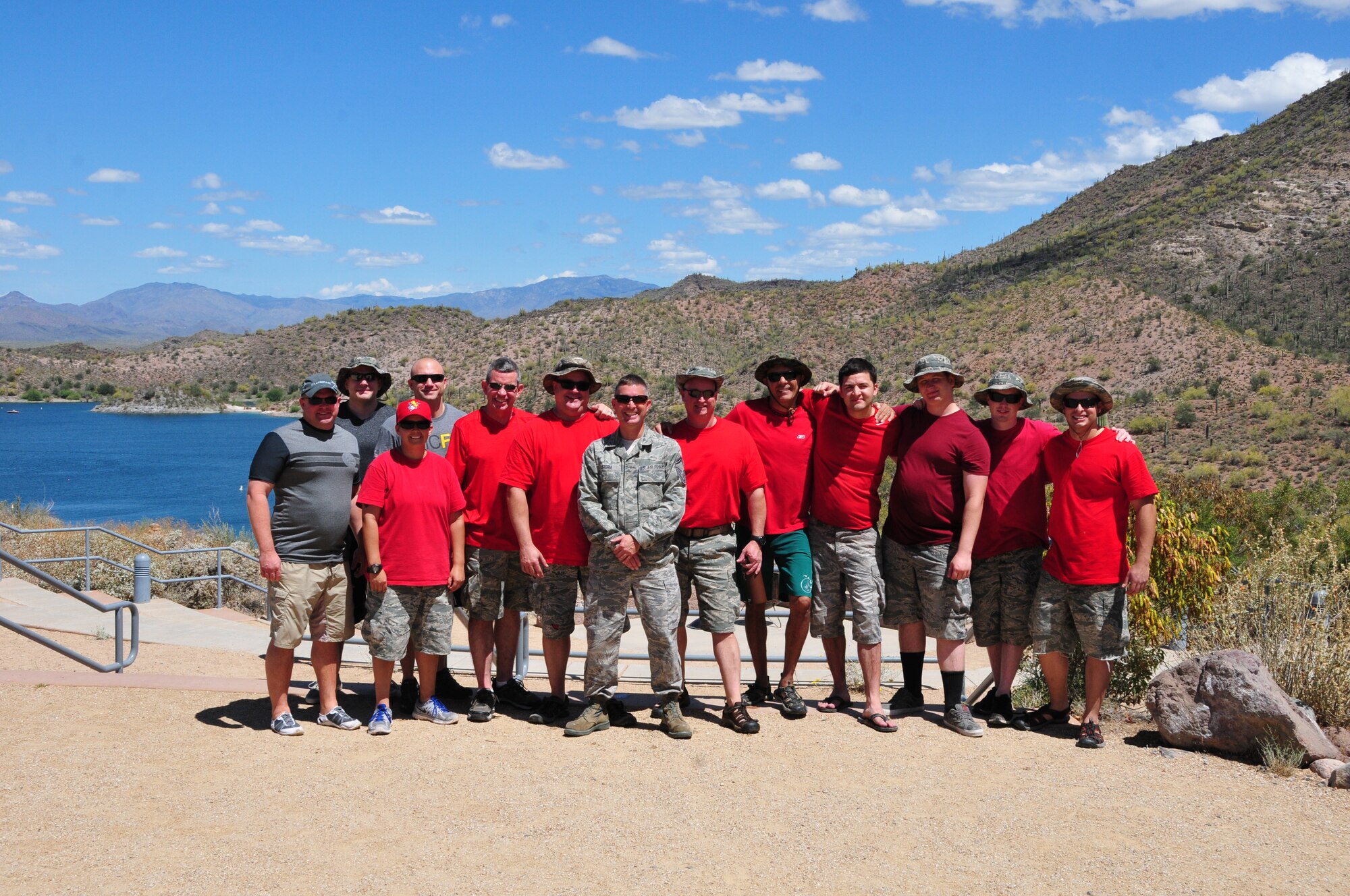 Col. Chris Triebel (left), 161st Air Refueling Wing vice commander, poses with the Aircrew Flight Equipment shop for a group photo after completing water survival training May 3, 2015, at Lake Pleasant, Peoria, Ariz. AFE is responsible for teaching the aircrew’s water survival refresher training every three years. (U.S. Air National Guard photo by Master Sgt. Kelly M. Deitloff)