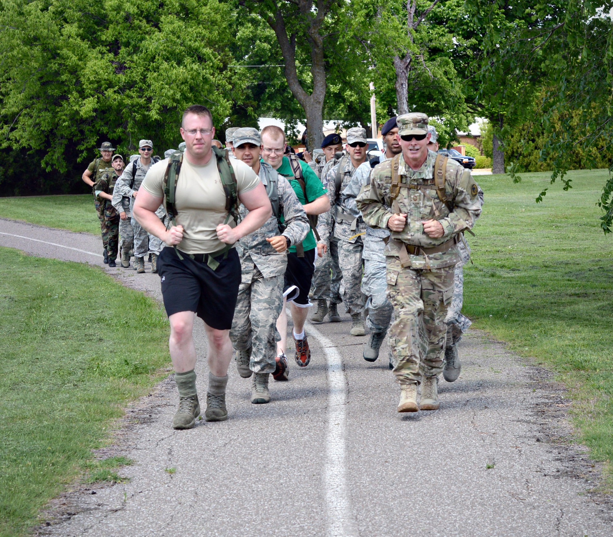 A ruck march was held on April 30 in remembrance of the 40th anniversary of the fall of Saigon and the end of the Vietnam War. Approximately 35 military and civilians showed up with their weighted rucks and marched 2 miles around the base trails. (Air Force photo by Kelly White/Released)