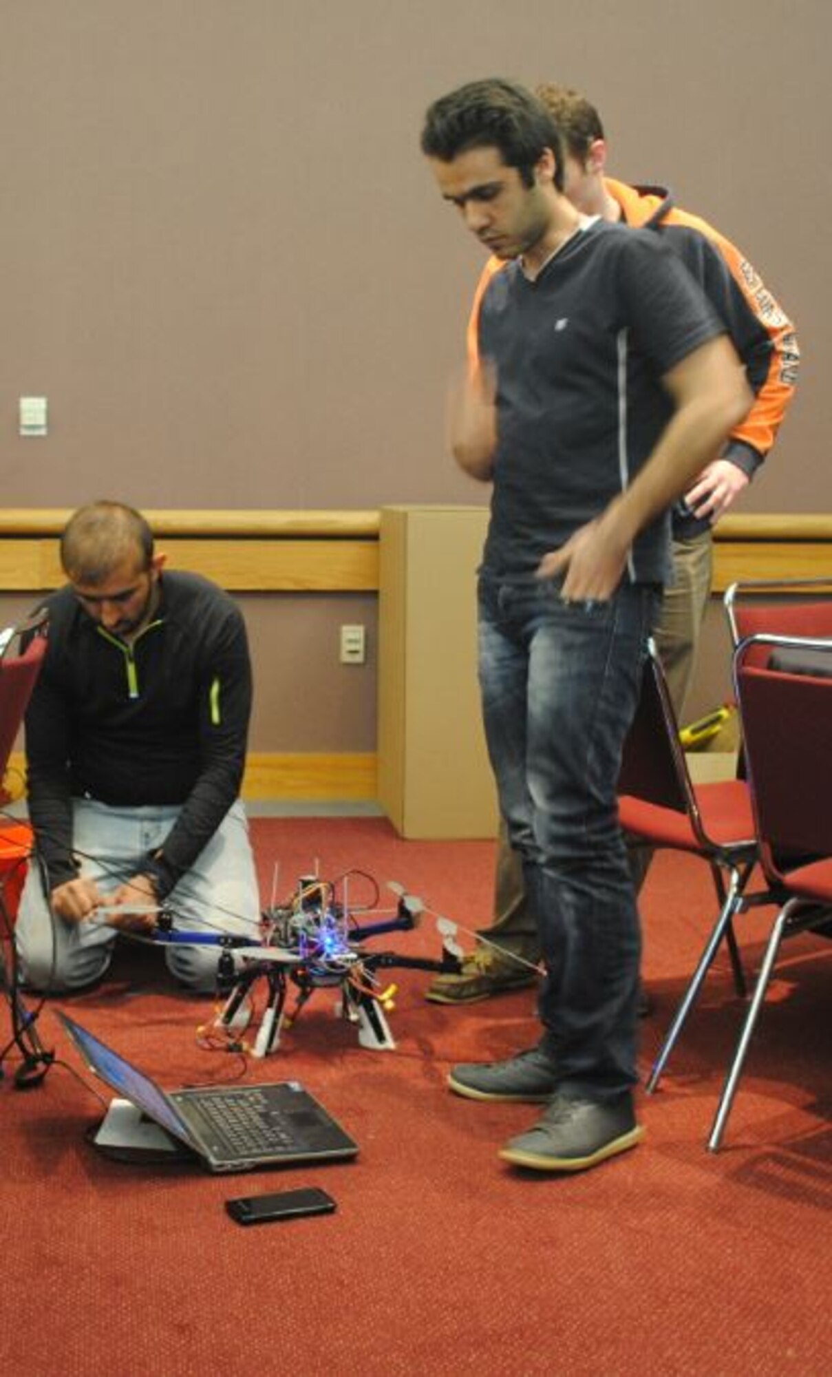 Members from the University of Toledo, Ohio, team make adjustments to their
multirotor aircraft prior to the autonomous aerial vehicle competition.  The
Air Force Research Laboratory Sensors Directorate hosted the event April
28-29 at the Dayton Convention Center. For the second consecutive year, the
University of Toledo took first place in the competition, which featured
$18,000 in prize money. (U.S. Air Force photo by Amanda King/88th Air Base Wing Public Affairs/Released)
