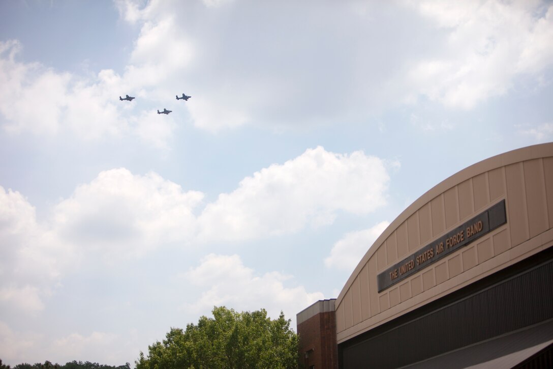 The flyovers that are part of the VE-Day Anniversary events at the WWII Memorial in Washington D.C. could be seen at the home of the United States Air Force Band, historic Hangar II on Joint Base Anacostia-Bolling, May 8, 2015. (U.S. Air Force Photo by Technical Sgt. Matthew Shipes/released).