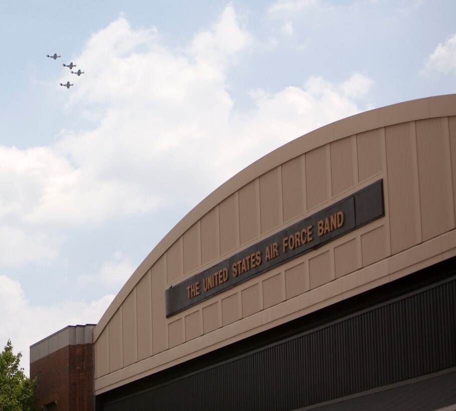 The flyovers that are part of the VE-Day Anniversary events at the WWII Memorial in Washington D.C. could be seen at the home of the United States Air Force Band, historic Hangar II on Joint Base Anacostia-Bolling, May 8, 2015. (U.S. Air Force Photo by Technical Sgt. Matthew Shipes/released).
