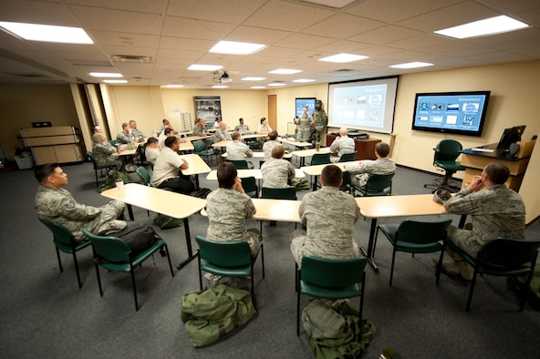 Airmen participate in a chemical, biological, radiological and nuclear defense survival skills training course on Nellis Air Force Base, Nev., April 30, 2015. The CBRN defense course consists of individual knowledge-based and demonstration performance objectives that provide an in-depth education on CBRN defense hazards and protective actions. (U.S. Air Force photo by Airman 1st Class Mikaley Towle)