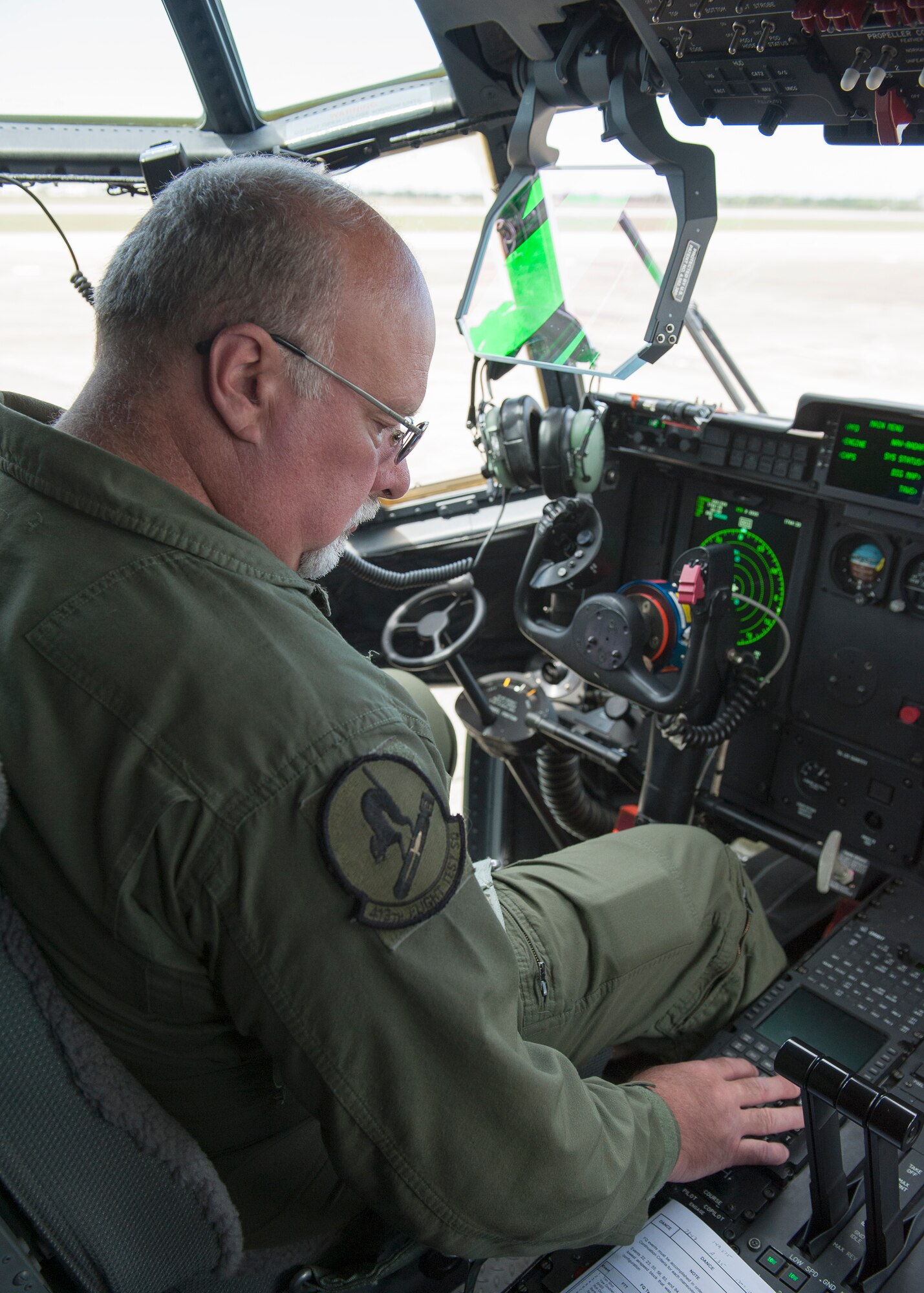 Andrew White, a test pilot with the 413th Flight Test Squadron, performs a pre-flight instrumentation check on the flight deck before an AC-130J sortie at Eglin Air Force Base, Fla., March 27.  The test mission was one of many to evaluate the flying and maneuverability qualities of the aircraft. The 413th FLTS plans, executes and reports development tests and evaluations of all of the Air Force’s Special Operations Command’s aircraft as well as the Air Force’s vertical lift aircraft.  (U.S. Air Force photo/Ilka Cole) 

