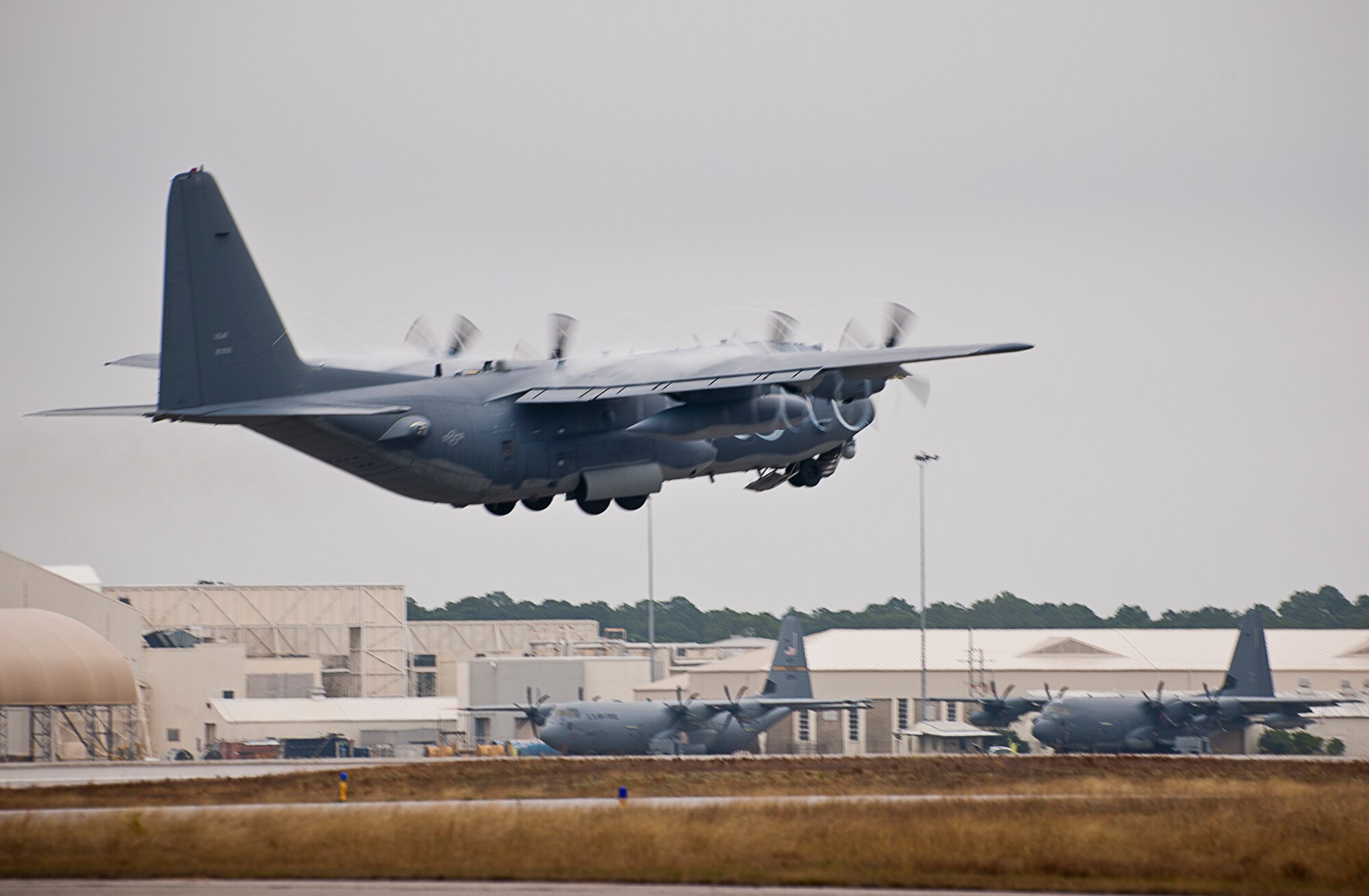 An Air Force Special Operations Command AC-130W lifts off for a test mission at Eglin Air Force Base, Fla.  The testing was conducted by the 413th Flight Test Squadron.  The 413th has three flights that perform developmental and qualification testing on Air Force propeller and rotor aircraft to include C-130s, CV-22s and UH-1s.  The three flights are geographically separated at Hurlburt Field, Eglin and Duke Field.  (U.S. Air Force photo/Samuel King Jr.)