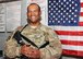 U.S. Air Force Tech. Sgt. Shawn Avery, 455th Expeditionary Security Forces Squadron NCO in charge of police services, smiles after learning of his selection for Officer Training School May 1, 2015 at Bagram Airfield, Afghanistan. After enlisting in 2001, Avery garnered recognition as an elite gate guard and Military Training Instructor, ultimately graduating from Park University with a degree in criminal justice and earning a candidacy at Officer Training School. (U.S. Air Force photo by Staff Sgt. Whitney Amstutz/ Released)
