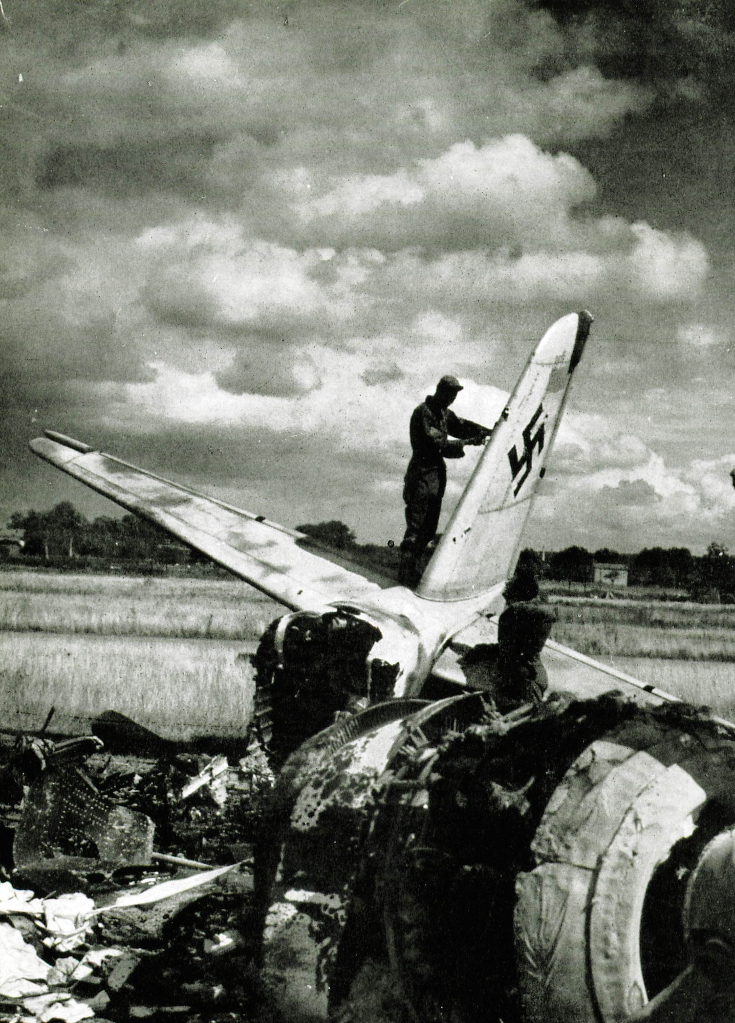 The remains of a German Luftwaffe Ju-88 night fighter litter one of the airfields the 371st Fighter Group operated from during World War II.   The 371st claimed credit for 165 enemy aircraft destroyed on the ground during World War II, and another 71 in the air.  (The Story of the 371st Fighter Group in the E.T.O.)

