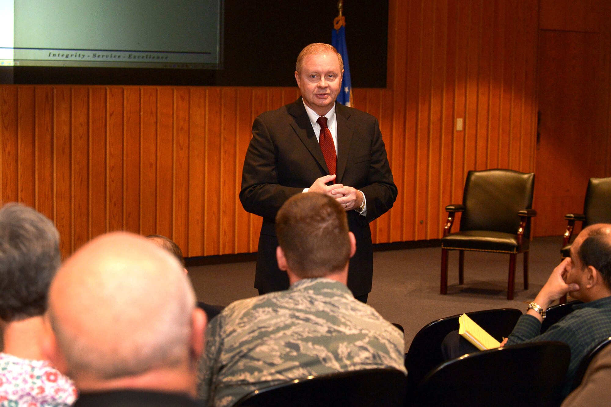 Robert Smothers, Enterprise Services Branch chief, assigned to Maxwell Air Force Base, Ala., answers a question from an audience member during a town hall briefing on NETCENTS-2 contracts, May 7. Topics discussed included available contracts for application services, network operations, infrastructure and products. NETCENTS experts in contracting, engineering and acquisition were available to assist with specific task orders and answer questions. (U.S. Air Force photo by Jerry Saslav)