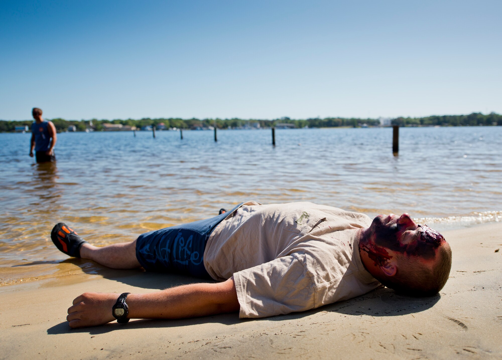 Simulated victims wait to be rescued after their aircraft crashed in the water in Valparaiso, Fla., May 5.  The large-scale joint exercise tested the response times and actions of base and local fire, emergency services and police personnel to an aircraft crash in local area waters.  Police, fire and medical technicians from Eglin, Valparaiso and Niceville participated in the exercise.  (U.S. Air Force photo/Samuel King Jr.)