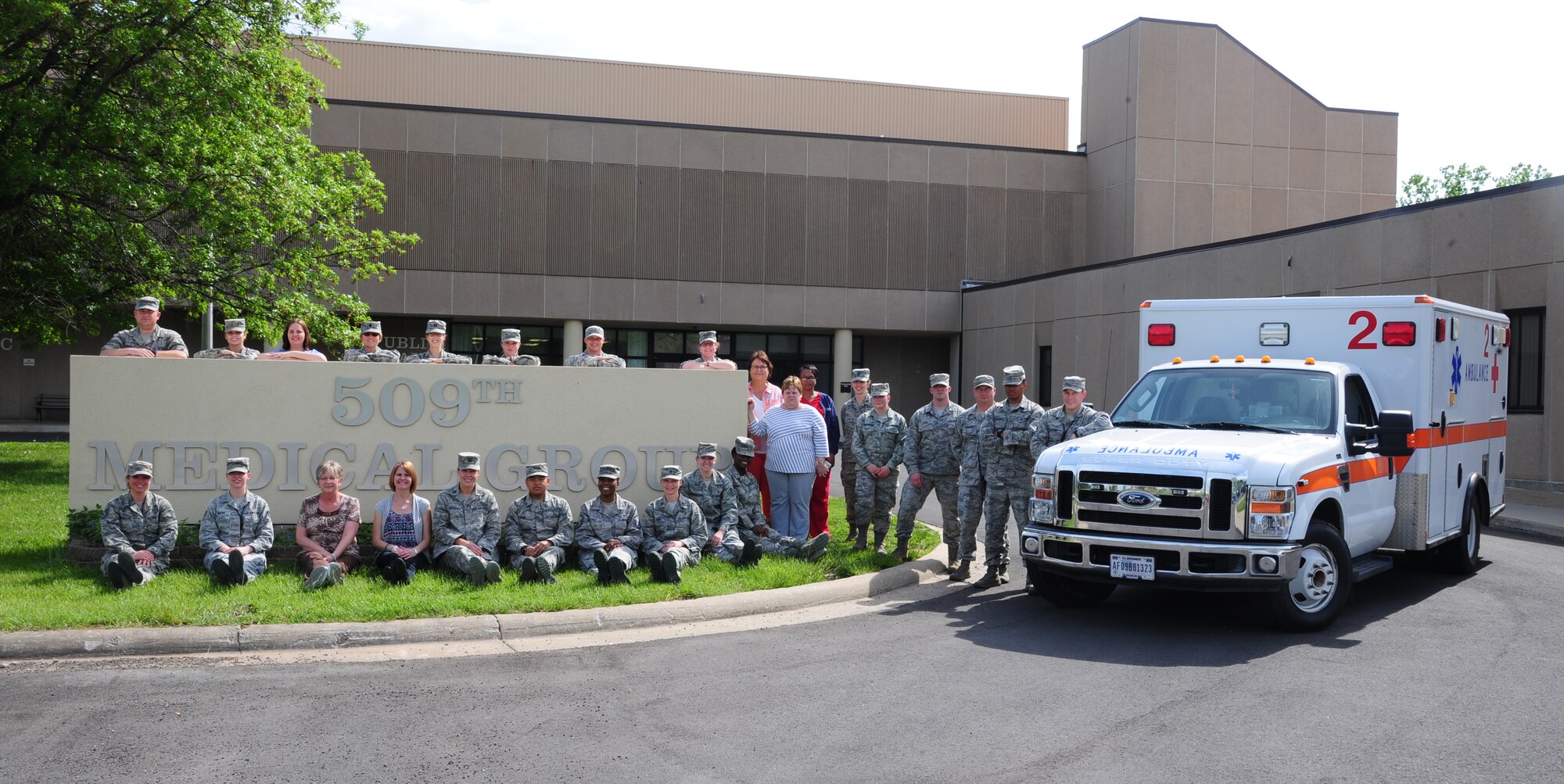 Members from the 509th Medical Group pose for a group photo for Nurse Appreciation Week at Whiteman Air Force Base, Mo., May 05, 2015. Nurses and medical technicians work behind the scenes ordering renewing medicine, reading communicating test results and relaying providing health information and education to patients. Doctors, nurses and medical technicians work together to ensure patient health improves. For most, inspiration to take care of people stems from prior experience and history. (U.S. Air Force Base photo by Senior Airman Keenan Berry/Released)