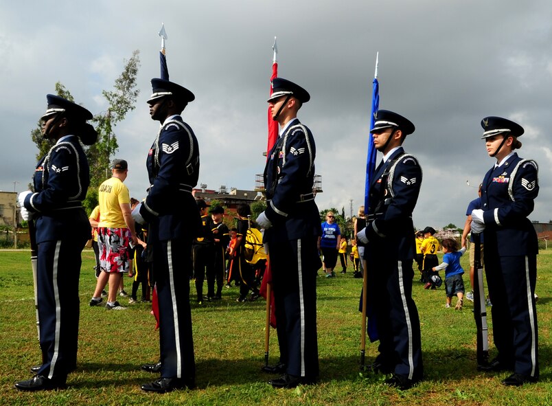 Incirlik Air Base Honor Guard guardsmen prepare to post the colors during the Incirlik Youth Sports baseball opening ceremony May 2, 2015, at IAB, Turkey. Various age groups from across base came together to start the 2015 youth baseball season. (U.S. Air Force photo by Staff Sgt. Caleb Pierce/Released) 