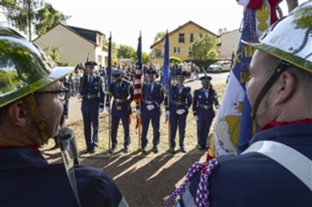 U.S. and French troops, French veterans and French residents gather in the village of Schoeneck, France, May 8, 2015, during the 70th anniversary of the Victory in Europe Day. The parade and ceremony commemorated the day Germany surrendered to allied forces in 1945, marking the end of World II in Europe. 