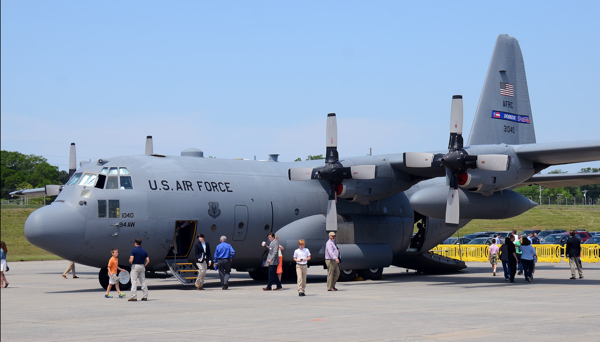 Parents and students get an up-close look at a 94th Airlift Wing C-130H3 aircraft during the 2015 Academy Day, Dobbins Air Reserve Base, Ga., May 9, 2015.The annual event provides high school students the opportunity to meet with representatives from each of the service academies, including West Point, the U.S. Naval Academy, the U.S. Air Force Academy, the Coast Guard Academy, and the U.S. Merchant Marines Academy. (U.S. Air Force photo/ Brad Fallin)