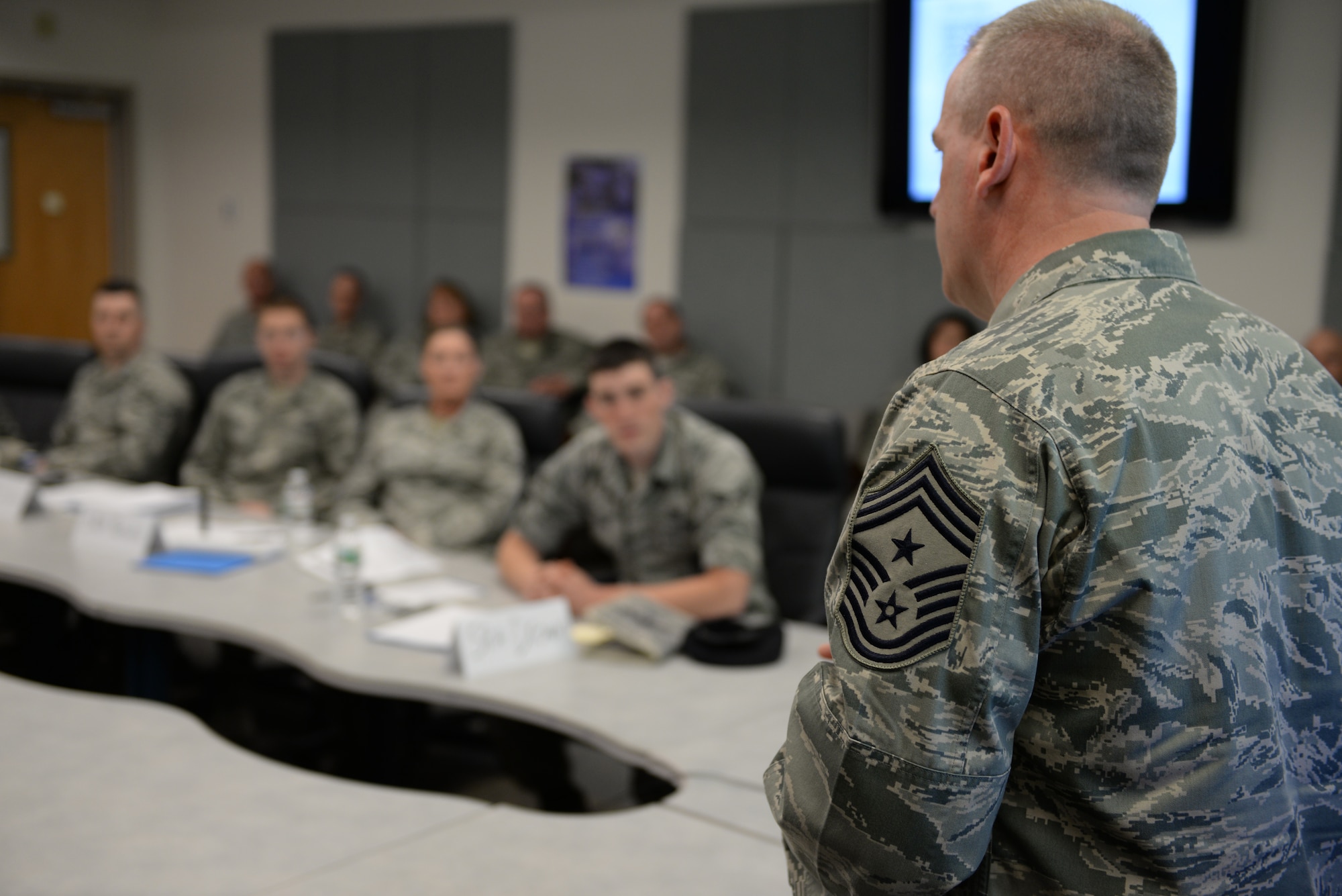 157th Air Refueling Wing Command Chief Master Sgt. Jamie Lawrence welcomes 10 senior airman to the first-ever Satellite Airman Leadership School class at Pease Air National Guard Base, N.H., May 9.  (U.S. Air National Guard photo by Staff Sgt. Curtis J. Lenz)