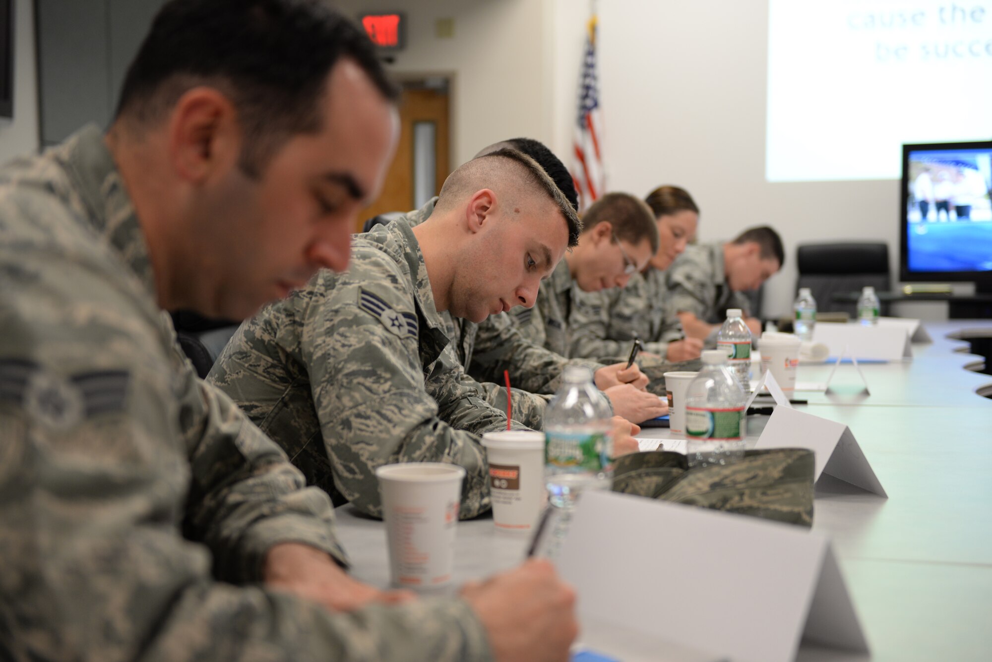 Ten senior airman attending a Satellite Airman Leadership School class 15-6 perform administrative tasks at Pease Air National Guard Base, N.H., May 9. The students will meet each Saturday and Sunday through mid-June and then complete an in-residence portion at McGhee Tyson Air National Guard Base, Tenn. (U.S. Air National Guard photo by Staff Sgt. Curtis J. Lenz)