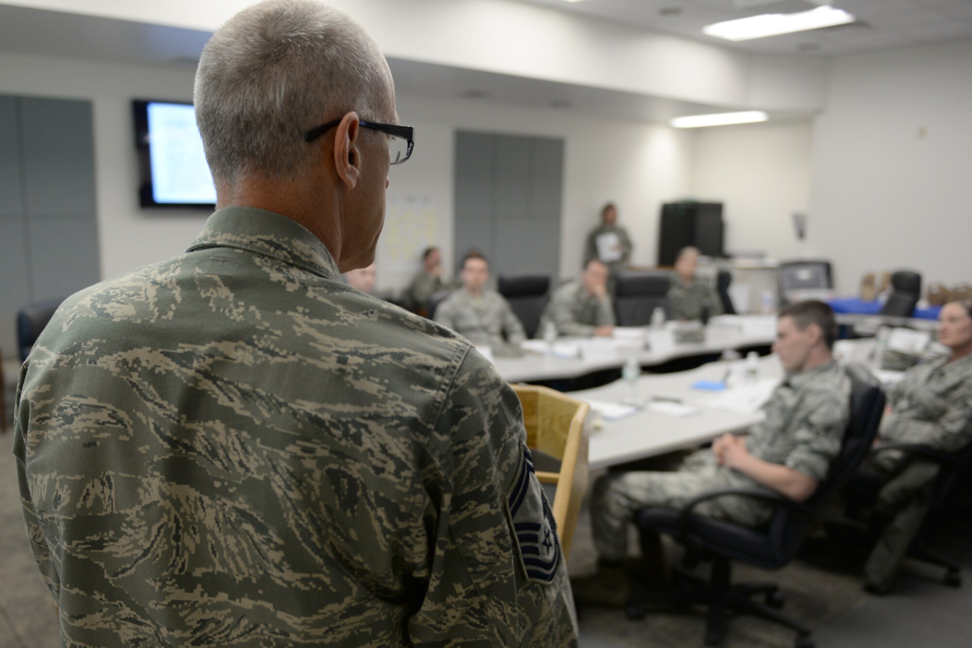 Senior Master Sgt. Michael Mercier, Satellite Airman Leadership School class 15-6 lead site facilitator, welcomes 10 students attending the first-ever course at Pease Air National Guard Base for senior airman, May 9. Mercier and other facilitators will instruct the students at Pease through instruction led by instructors at McGhee Tyson Air National Guard, Base, Tenn. (U.S. Air National Guard photo by Staff Sgt. Curtis J. Lenz)