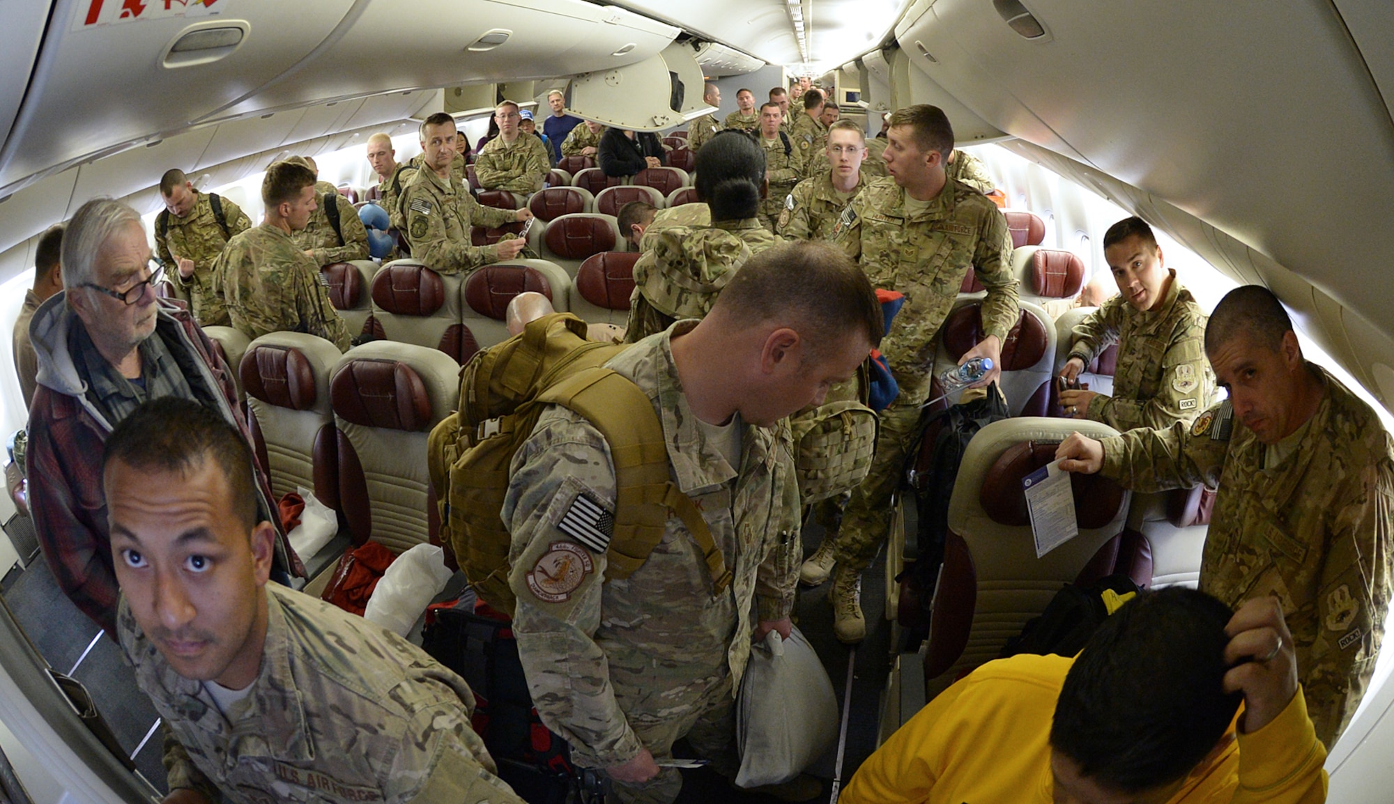 Airmen coming home from a six-month deployment in Afghanistan wait to deplane and greet their families. Pilots, maintenance, and operations support personnel from the 388th Fighter Wing and 419th Fighter wing were assigned to the 455th Expeditionary Operations Group alongside Airmen from Hill's active-duty 388th Fighter Wing. The deployment is part of Operation Freedom's Sentinel, which aims to maintain security and stability in the area following Operation Enduring Freedom, which officially concluded in 2014.(U.S. Air Force/Alex R. Lloyd)