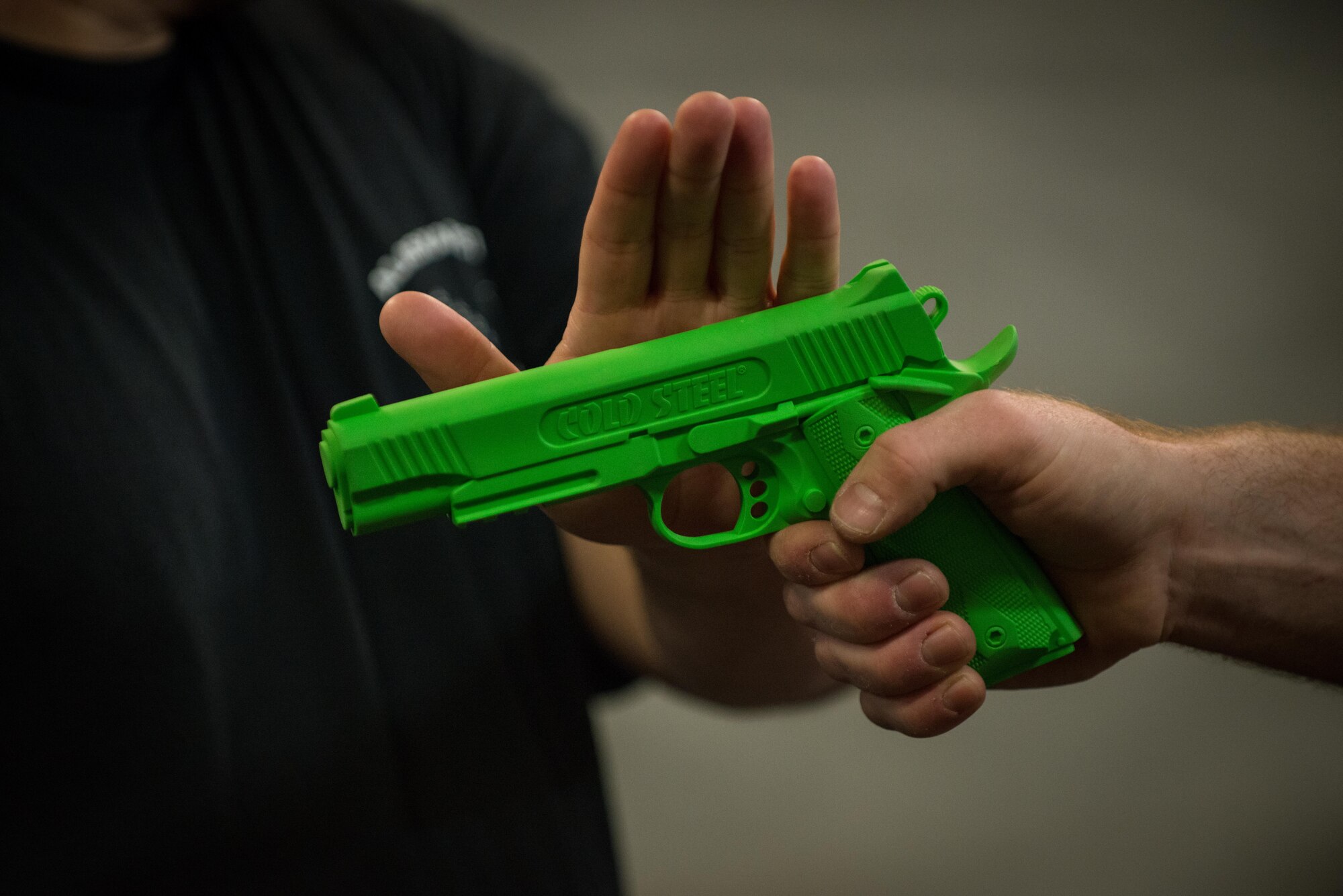 Jack Waid, 455th Air Expeditionary Wing historian, demonstrates a Krav Maga technique during a bi-weekly class at Bagram Airfield, Afghanistan, May 7, 2015. The training helps Airmen better understand how to defend themselves where they live and work while in a combat environment. (U.S. Air Force photo by Tech. Sgt. Joseph Swafford/Released)