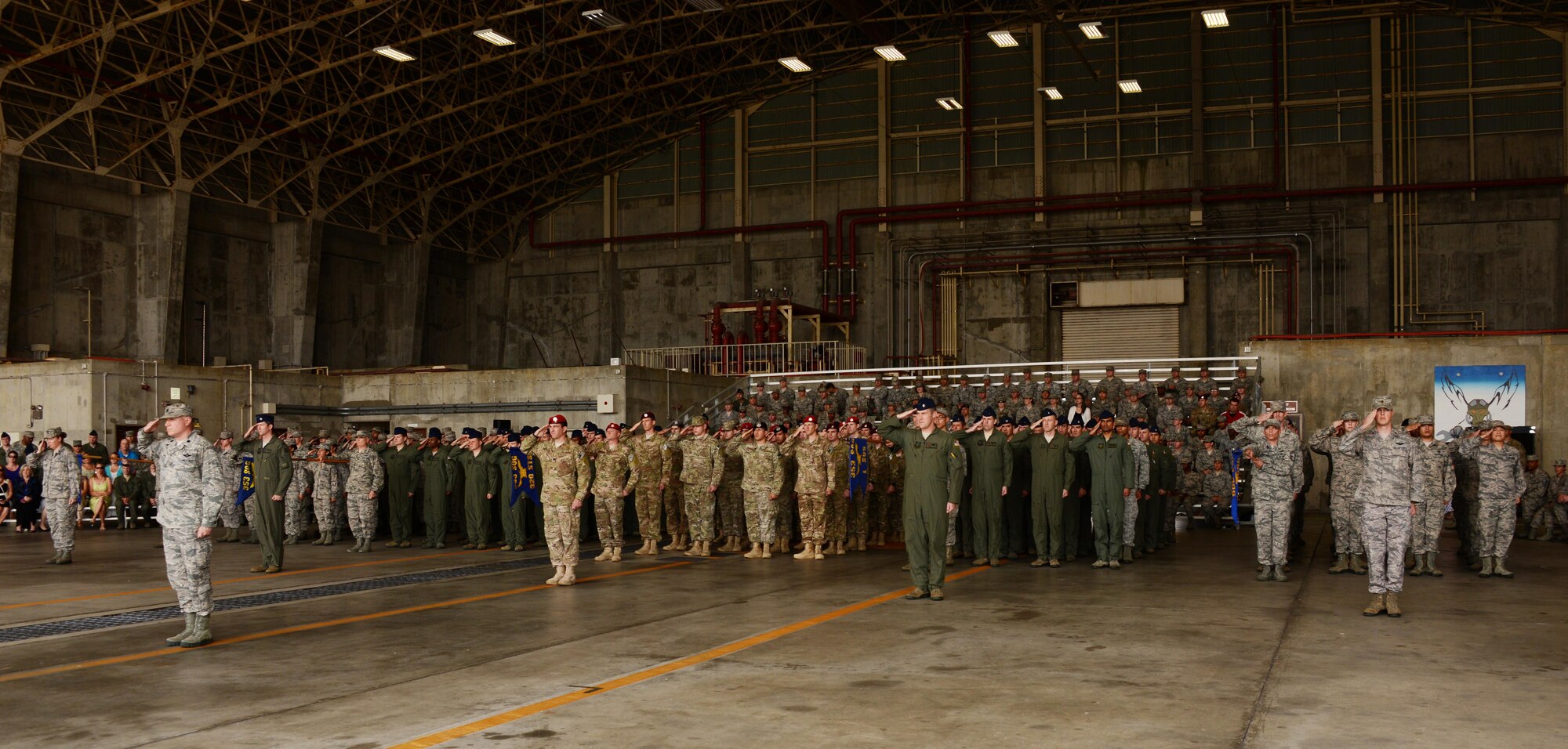 Members of the 353rd Special Operations Group render their first salute to their new commander, Col. William C. Freeman during an assumption of command ceremony May 8, 2016 on Kadena Air Base, Japan.  The 353rd SOG is the Air Force’s only special operations unit in the Pacific. (U.S. Air Force photo by Tech. Sgt. Kristine Dreyer)