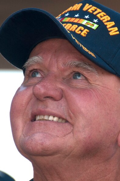 A Vietnam veteran of the 307th Bomb Wing smiles during the unveiling of new nose art for the B-52 Stratofortress " Lone Star Lady" at Barksdale Air Force Base, La., May 1, 2015.   The new art is based on a design from a B-52 flown during the Vietnam War. The art was created in honor of the veterans that served during that era. (U.S. Air Force photo by Tech. Sgt. Ted Daigle)