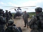 Members of the 121st Medical Company, Air Ambulance of the District of Columbia National Guard prepare for a mission in Hohenfels, Germany. The unit conducted its first medical evacuation with the UH-72 Lakota helicopter in Germany on Aug. 10, 2010.