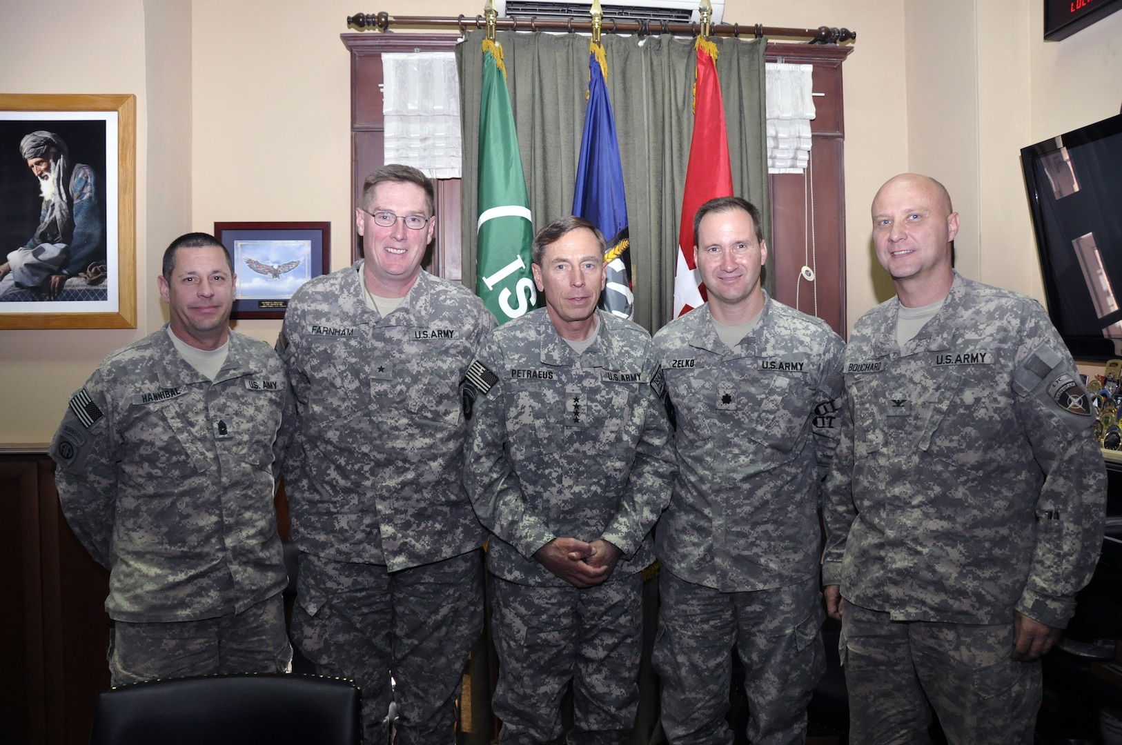 Members of the Afghan National Security Forces Development Assistance Bureau (ADAB) team from left to right are: Command Sgt. Maj. Richard Hannibal, Brig. Gen. Jonathan Farnham, director of the Afghan National Security Forces (ANSF) Development Assistance Bureau; Gen. John Petraeus, Lt. Col. Tom Zelko, a Vermont Guard member and ANA division chief; and Col. Mike Bouchard of the Maine Army National Guard and the ANP division chief, pose for a group photo after briefing Petraeus on Afghan Security Force developments.