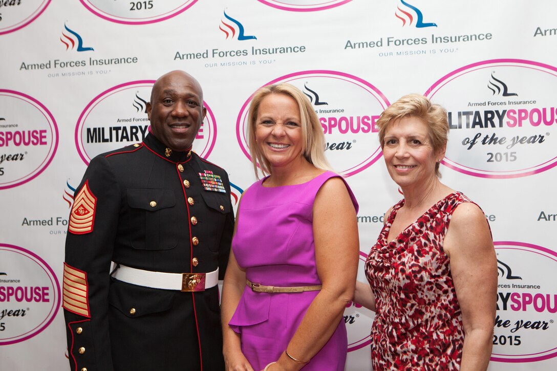 Sgt. Maj. Ronald L. Green, the 18th Sergeant Major of the Marine Corps, poses for a photo with Mrs. Nicole Spaid (left) and Mrs. Ellyn Dunford at the 8th annual awards luncheon announcing the 2015 Military Spouse of the Year at the Fort Myers Officers' Club, May 8, 2015. (U.S. Marine Corps photo by Sgt. Melissa Marnell) 