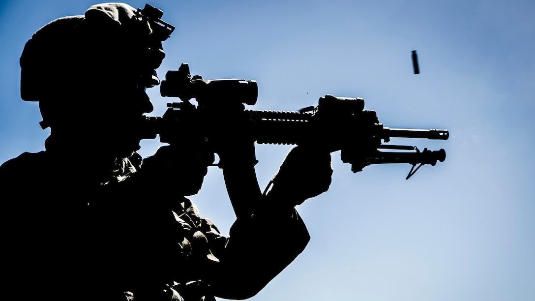 A U.S. Marine with Special-Purpose Marine Air-Ground Task Force Crisis Response-Africa fires his Infantry Automatic Rifle at a training range in Sierra Del Retin, Spain, May 6, 2015. The light weight and rapid-fire capabilities of the IAR allows the Marines to suppress enemy positions while maintaining a high level of maneuverability.