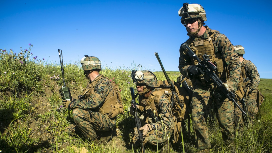 U.S. Marines with Special-Purpose Marine Air-Ground Task Force Crisis Response-Africa run through a creek bed at a training range in Sierra Del Retin, Spain, May 6, 2015. The Spanish Marine Corps opened the range for SPMAGTF-CR-AF to allow the unit to complete live-fire training exercises while deployed to Spain.