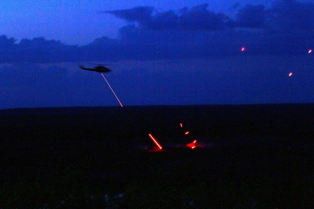 Rounds fired from a Canadian Armed Forces aircraft impact on targets during Exercise Maple Resolve 2015 at the Canadian Manoeuvre Training Center, Camp Wainwright, Alberta, May 5, 2015. The Marines and Sailors of 1st Air Naval Gunfire Liaison Company, I Marine Expeditionary Force Headquarters Group teamed up with members of the Canadian Armed Forces and conducted a series of close air support missions from fixed and rotary wing aircraft using live munitions. (U.S. Marine Corps photo by Staff Sgt. Bobbie Curtis)