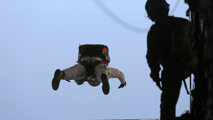 Critical skills operators with U.S. Marine Corps Forces Special Operations Command leap out of a KC-130J Super Hercules during parachute training above Marine Corps Base Camp Lejeune, North Carolina, May 6, 2015. CSOs were supported by Marine Aerial Refueler Transport Squadron 252 from Marine Corps Air Station Cherry Point, North Carolina. Aerial deliveries are one of the mission essential skills VMGR-252 provides in support of the Marine Air-Ground Task Force.