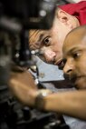 LtCol James Richardson and GySgt Joe Perera troubleshooting the Modular Advanced Armed Autonomous Robotic System (MAARS). MAARS is one of the unmanned systems the Marine Corps had on display at the expo.