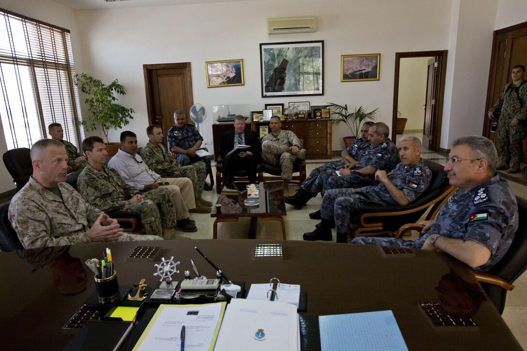 U.S. Marine Corps Maj. Gen. Burke Whitman, commanding general, Coalition Forces Land and Maritime Component Command, meets with Brig. Gen. Qasem Al'Nahar, commander, Royal Jordanian Naval Base (RJNB), in Jordan in preparation for Exercise Eager Lion, May 3, 2015. Eager Lion is a recurring multinational exercise designed to strengthen military-to-military relationships, increase interoperability between partner nations, and enhance regional security and stability. (U.S. Marine Corps photo by Cpl. Sean Searfus CE MARFOR CENTCOM FWD COMCAM/ Released)