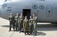 Twelve-year-old Celina Dennis (center) of Poland, Ohio, poses with the aircrew of a C-130H Hercules aircraft here, May 6, 2015. Aircrew members from left to right are Tech. Sgt. Ken Filewich, 757th Airlift Squadron (AS) flight engineer; Capt. Steve Miller, 757AS pilot; 1st Lt. Jordan Criswell, 757AS pilot; Master Sgt. Jade Foley, 757AS loadmaster and Lt. Col. Roark Endlich, aircraft commander. Dennis was selected as the 910th Airlift Wing’s 61st Pilot for a Day, being sworn in as an honorary 2nd Lt. and treated to a day of military-themed activities here. Pilots for a Day are local children with chronic or life-threatening illnesses selected by Akron Children’s Hospital Boardman campus. (U.S. Air Force photo/Eric M. White