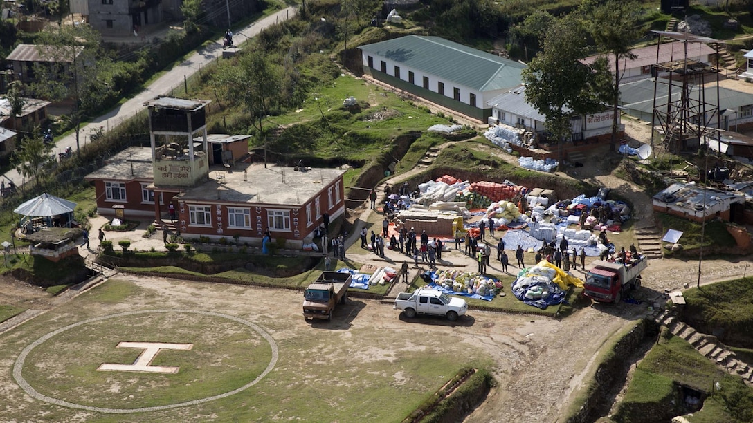 A UH-1Y Huey prepares to land in Charikot, Nepal, May 5. Marines with Marine Light Attack Helicopter Squadron 469 and Marine Medium Tilt Rotor Squadron 262 carried supplies in a UH-1Y Huey and MV-22 Ospreys to Charikot, Nepal. The supplies will provide Nepalese people with shelter after a 7.8 magnitude earthquake struck central Nepal, April 25, causing fatalities, injuries and significant damage. The government of Nepal declared a state of emergency and requested international assistance. The U.S. military, at the direction of the U.S. Agency for International Development, will continue to support Nepal as needed. HMLA-469 and VMM-262 are attached to Marine Aircraft Group 36, 1st Marine Aircraft Wing, III Marine Expeditionary Force.