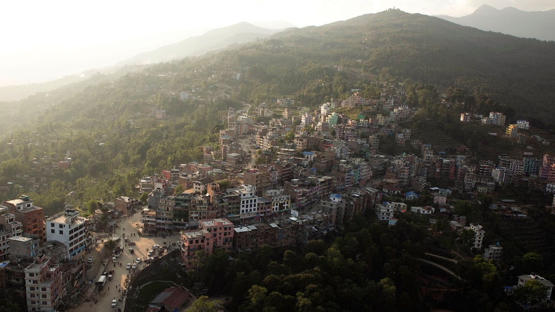 A UH-1Y Huey flies over Charikot, Nepal, May 5. Marines with Marine Light Attack Helicopter Squadron 469 and Marine Medium Tilt Rotor Squadron 262 carried supplies in a UH-1Y Huey and MV-22 Ospreys to Charikot, Nepal. The supplies will provide Nepalese people with shelter after a 7.8 magnitude earthquake struck central Nepal, April 25, causing fatalities, injuries and significant damage. The government of Nepal declared a state of emergency and requested international assistance. The U.S. military, at the direction of the U.S. Agency for International Development, will continue to support Nepal as needed. HMLA-469 and VMM-262 are attached to Marine Aircraft Group 36, 1st Marine Aircraft Wing, III Marine Expeditionary Force.