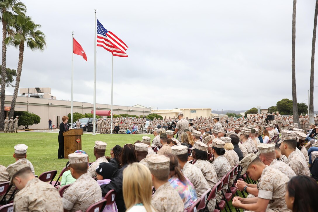 Marines with the 3rd Marine Aircraft Wing retire the evening's colors for a special spousal appreciation ceremony aboard Marine Corps Air Station Miramar, California, May 6.  Maggie Coleman, widow to Jerry Coleman, World War II and Korean War Veteran, spoke to more than 1,000 Marines, Sailors and guests.
