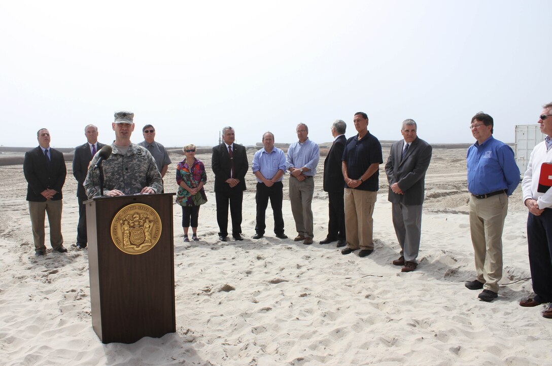 U.S. Army Corps of Engineers' Philadelphia District Deputy Commander Lt. Col. Andrew Yoder spoke during a May 7 media event with Congressman LoBiondo, the New Jersey Department of Environmental Protection, local communities, and contractor Great Lakes Dredge & Dock Company. The event kicked off construction of the Long Beach Island Storm Damage Reduction Project, which is designed to reduce damages from future storm events. 