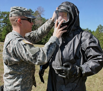 A Georgia National Guard member from Joint Task Force 781 tests a new decontamination suit during a recent three-day exercise at the Florida National Guard’s Urban Defense and Disaster Response Training Site at Camp Blanding.