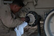 Corporal Christian Bills, gunner, Company A, 1st Tank Battalion, 1st Marine Division, nicknamed “America’s Company,” performs maintenance on his M1A1 Abrams Main Battle Tank named Star Lord during Exercise Desert Scimitar aboard Marine Corps Air Ground Combat Center Twentynine Palms, Calif., April 11, 2015. Desert Scimitar enables 1st Marine Division to test and refine its command and control capabilities and ensures 1st Marine Division units remain committed to consistently improving the quality of their training efforts and their resultant warfighting capabilities.