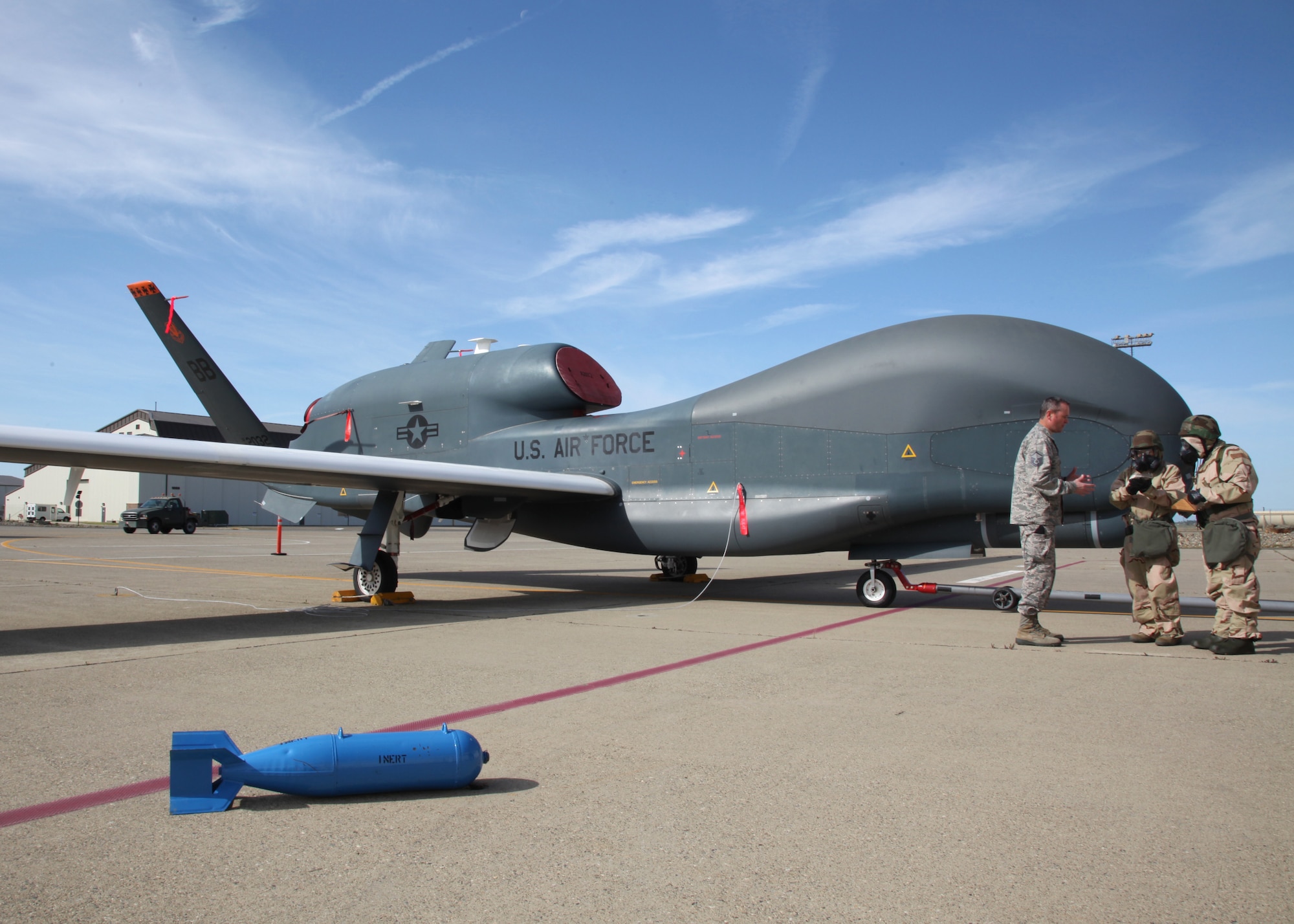 Beale reservists search for simulated explosives on the flightline, April 12, 2015, Beale Air Force Base, California. The scenarios honed members’ skills for dealing with various attack scenarios. (U.S. Air Force photo by Tech. Sgt. Kenneth McCann/Released) 