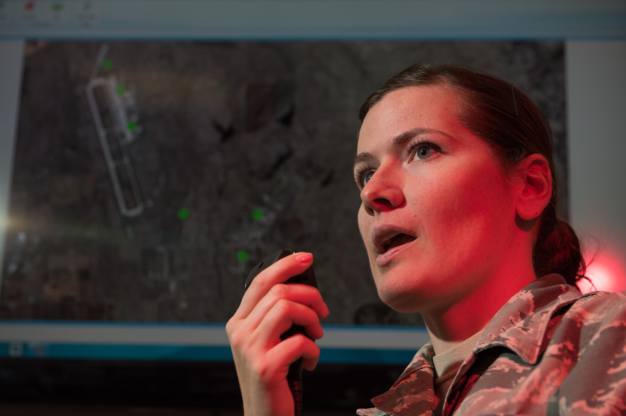 Staff Sgt. Brittainy Ward, 940th Wing senior emergency action controller and reports manager, operates the giant voice system, March 23, 2015, Beale Air Force Base, California. The giant voice system is a tool that helps the associated Beale Command Post quickly route potentially life-saving notifications base-wide. (U.S. Air Force photo by Staff Sgt. Brenda Davis/Released)

