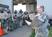 Senior Master Sgt. Jessica Feil, 713th Combat Operations Squadron emergency manager planner, directs teams of airman to a transition control point during an operational readiness exercise, Beale Air Force Base, California, April 12, 2015. From there, teams of Reservists checked each other for simulated contamination. They also responded to various simulated scenarios and practiced proper procedures for responding to biological and chemical attacks. (U.S. Air Force photo/Tech. Sgt. Heather Skinkle)